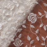 gorgeous-white-thread-with-sequins-floral-leafy-embroidery-on-dyeable-white-soft-net-fabric.